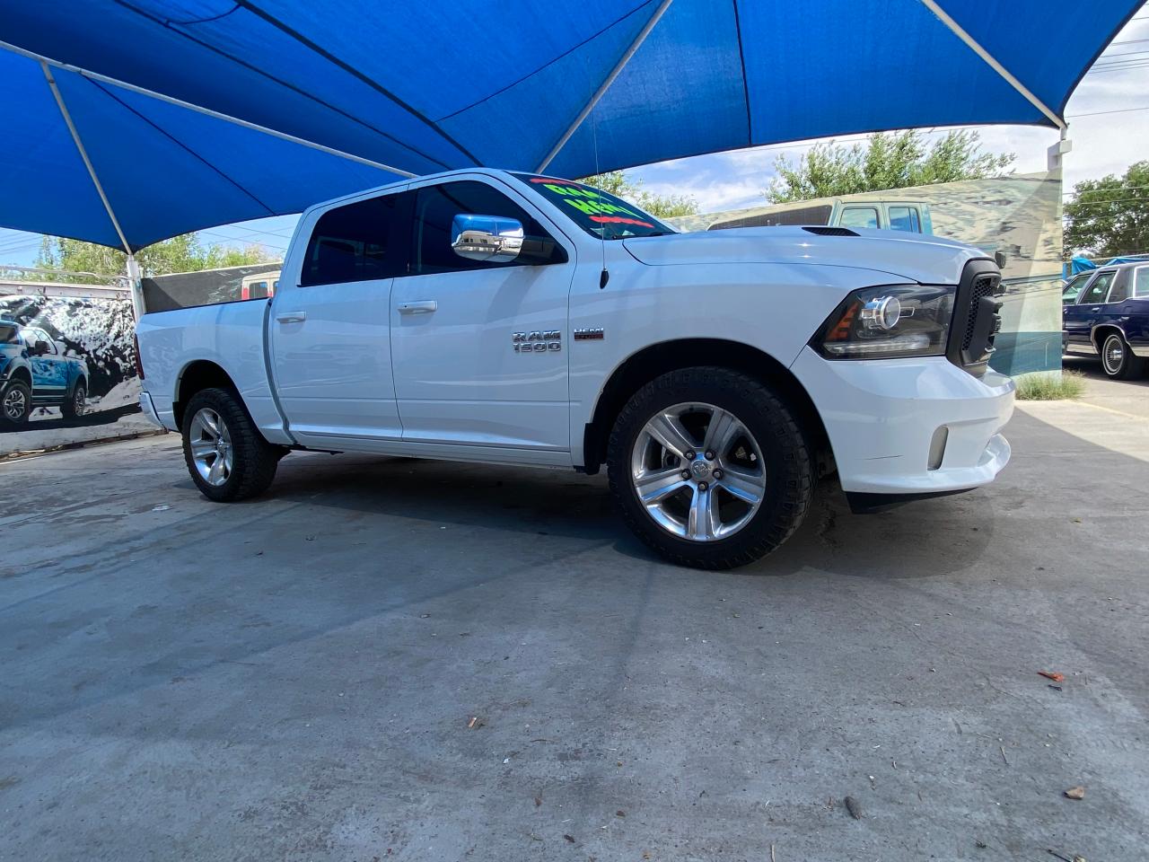 Photo 4 from auction – 2014 RAM 1500 SPORT with VIN 1C6RR6MT1ES245445