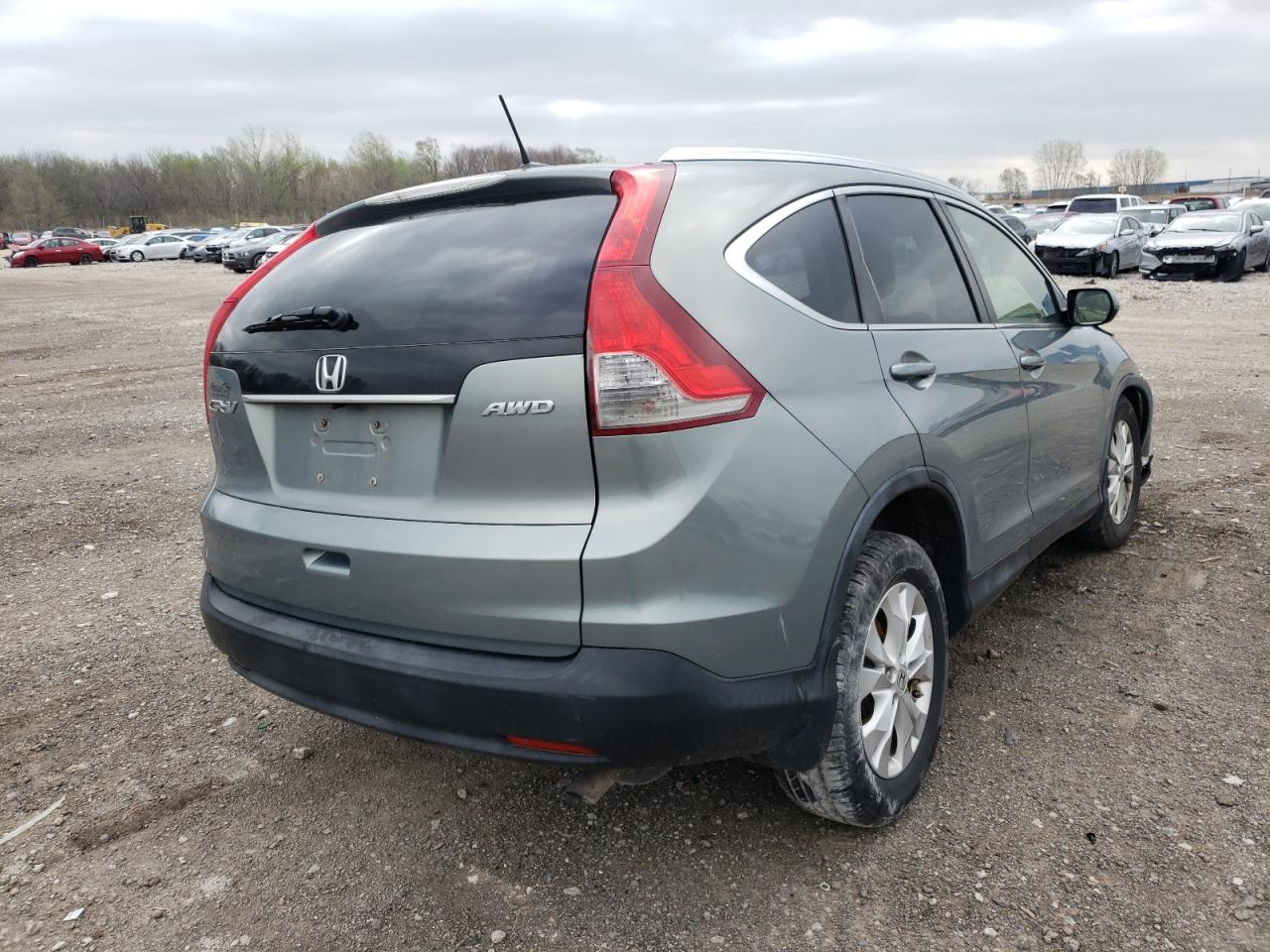 Photo 4 from auction – 2012 HONDA CR-V EXL with VIN JHLRM4H72CC013004