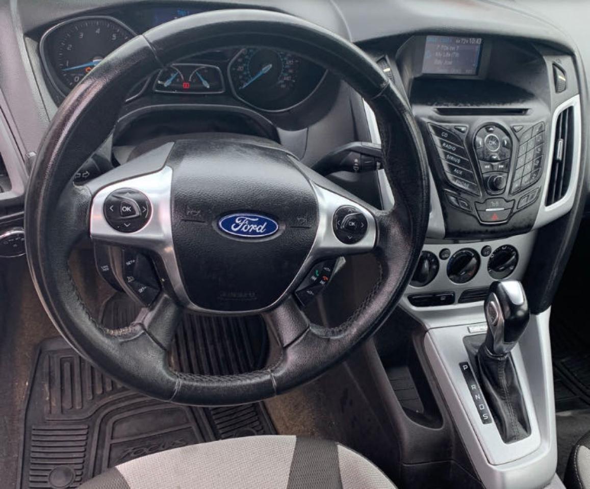 Photo 9 from auction – 2012 FORD FOCUS SE with VIN 1FAHP3K25CL193320