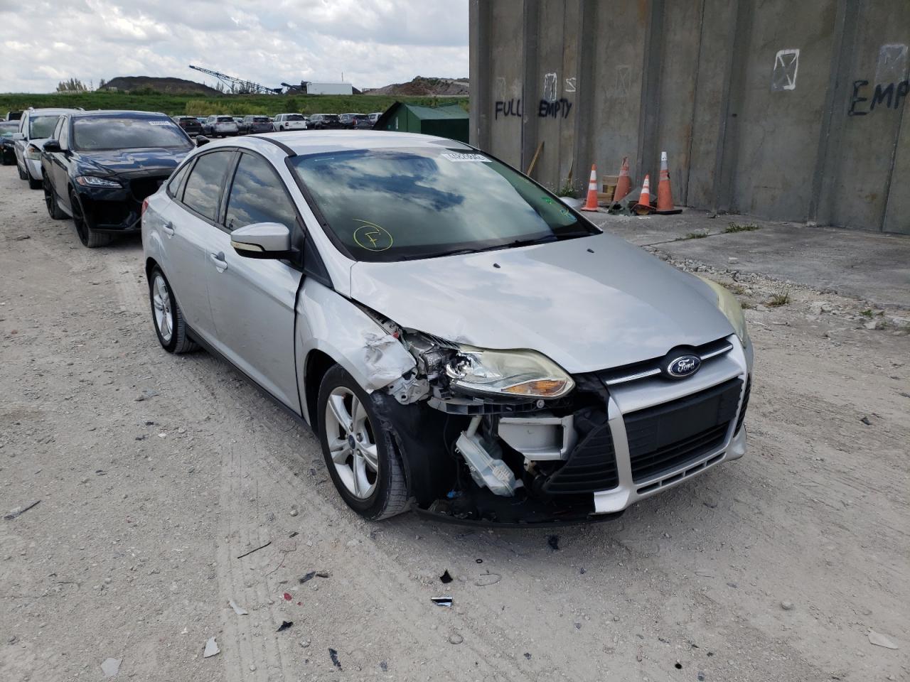 FORD FOCUS SE 2014 with VIN 1FADP3F24EL115266 - Photo from auction