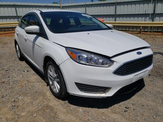 FORD FOCUS SE 2017 with VIN 1FADP3K27HL338864 - Photo from auction