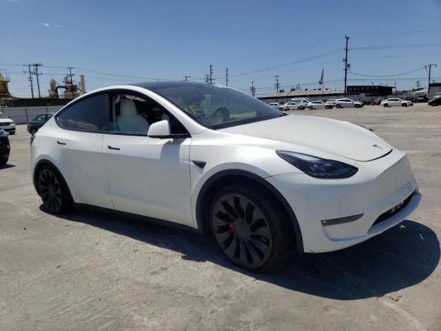 TESLA MODEL Y 2022 with VIN 7SAYGDEF7NF341281 - Photo from auction