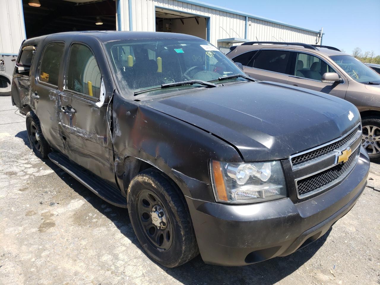 CHEVROLET TAHOE POLI 2013 with VIN 1GNLC2E07DR157946 - Photo from auction