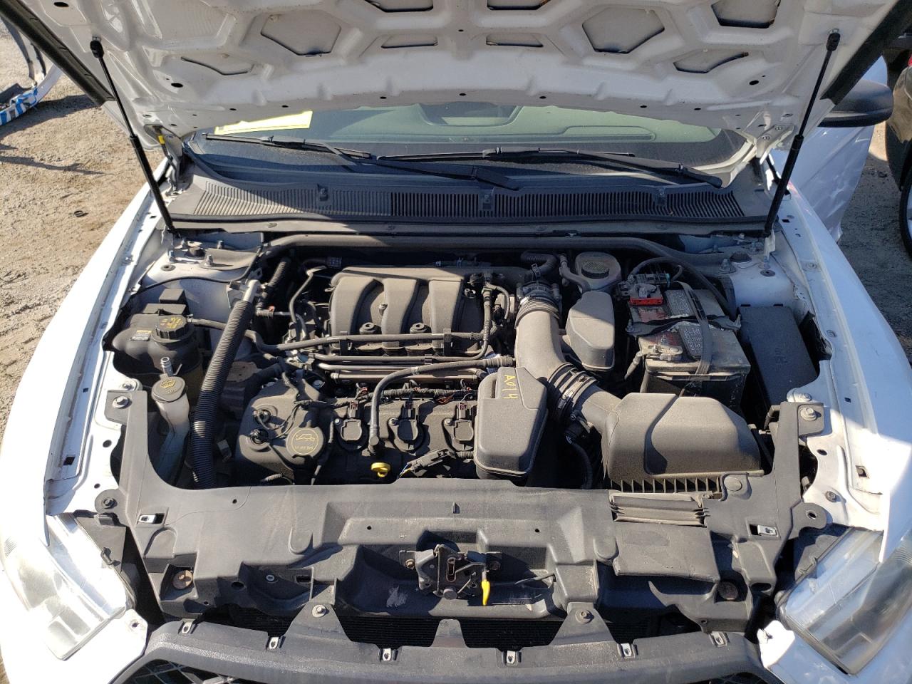 Photo 7 from auction – 2014 FORD TAURUS POL with VIN 1FAHP2MK5EG109242