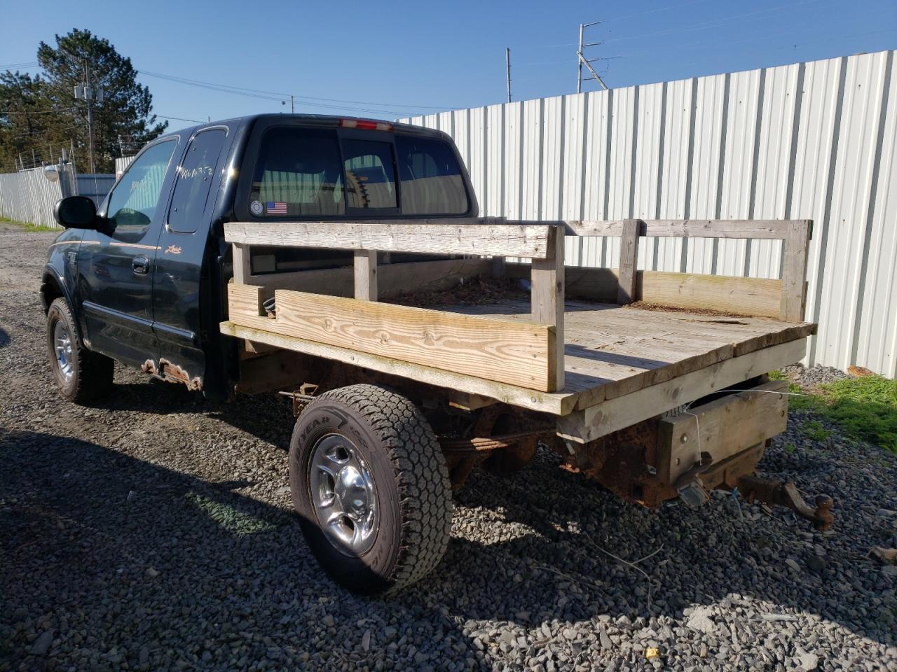 Photo 3 from auction – 1999 FORD F150 with VIN 1FTRX18L2XNB05546