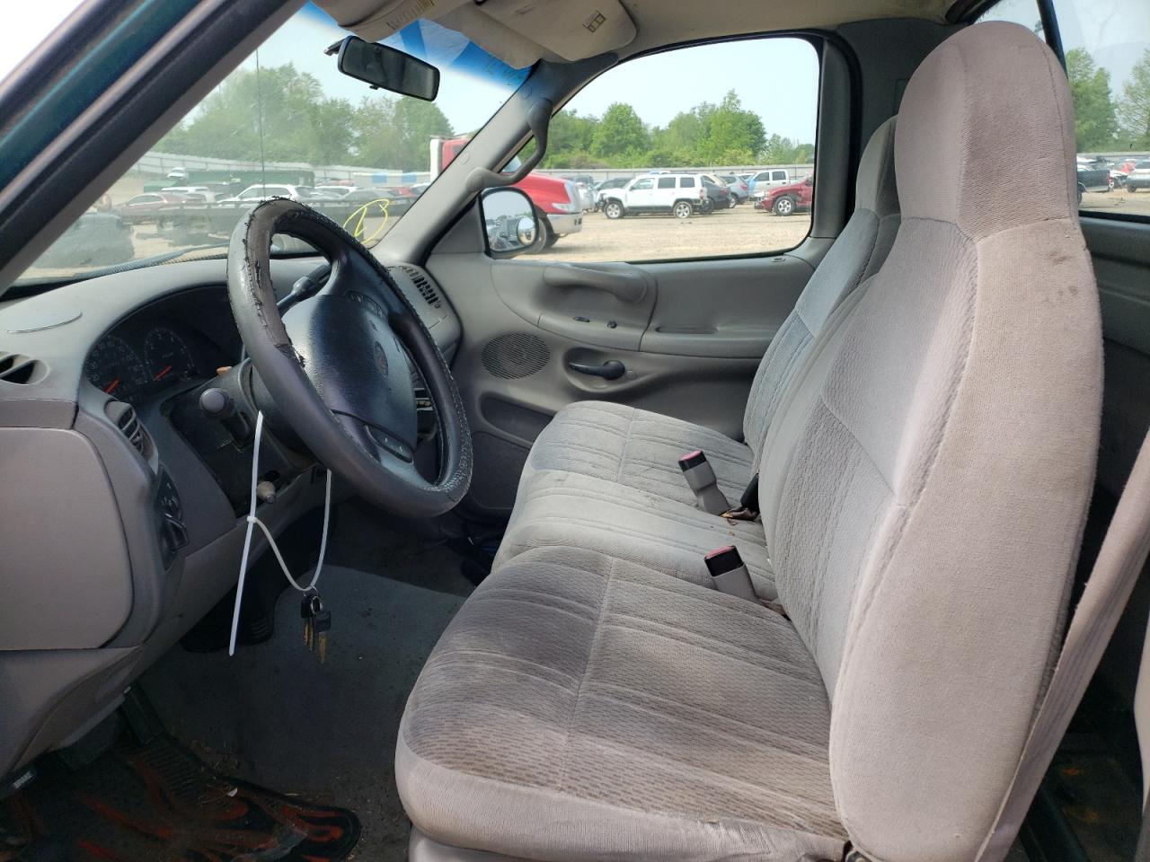 Photo 5 from auction – 1998 FORD F150 with VIN 1FTZF1765WKA31215