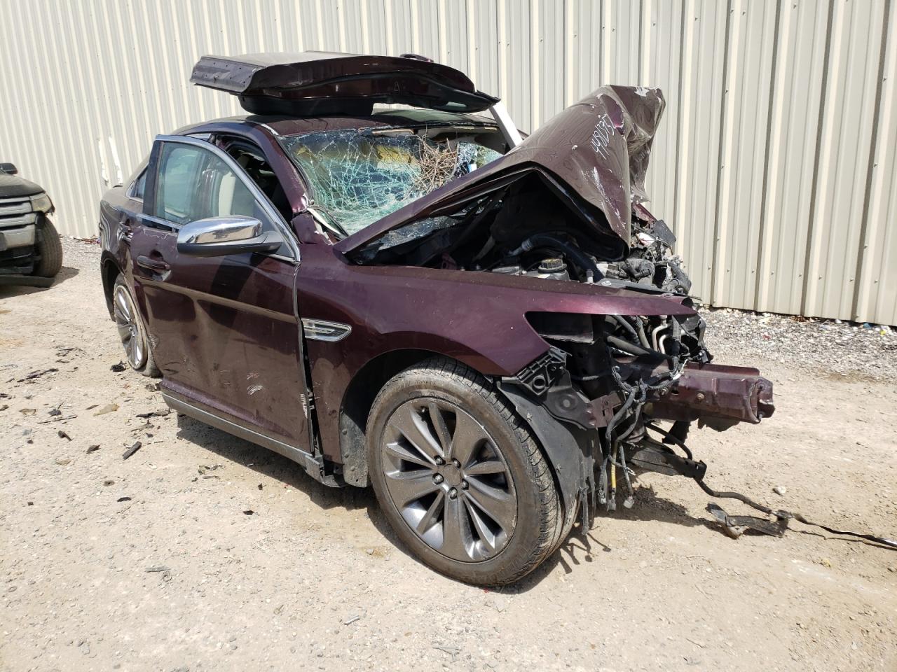 FORD TAURUS LIM 2011 with VIN 1FAHP2FWXBG113038 - Photo from auction