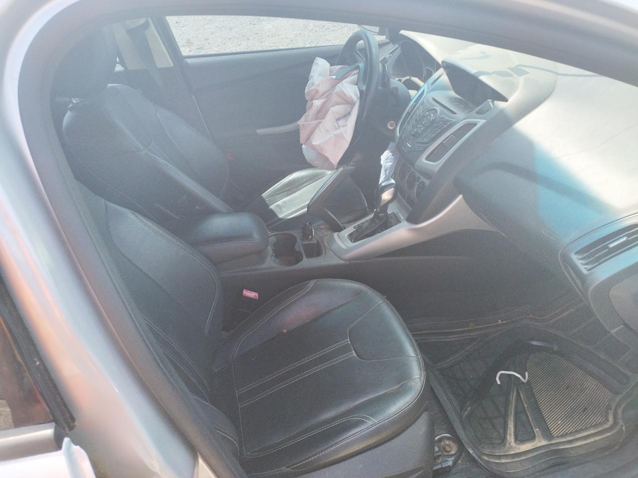 Photo 5 from auction – 2013 FORD FOCUS SE with VIN 1FADP3F29DL331127