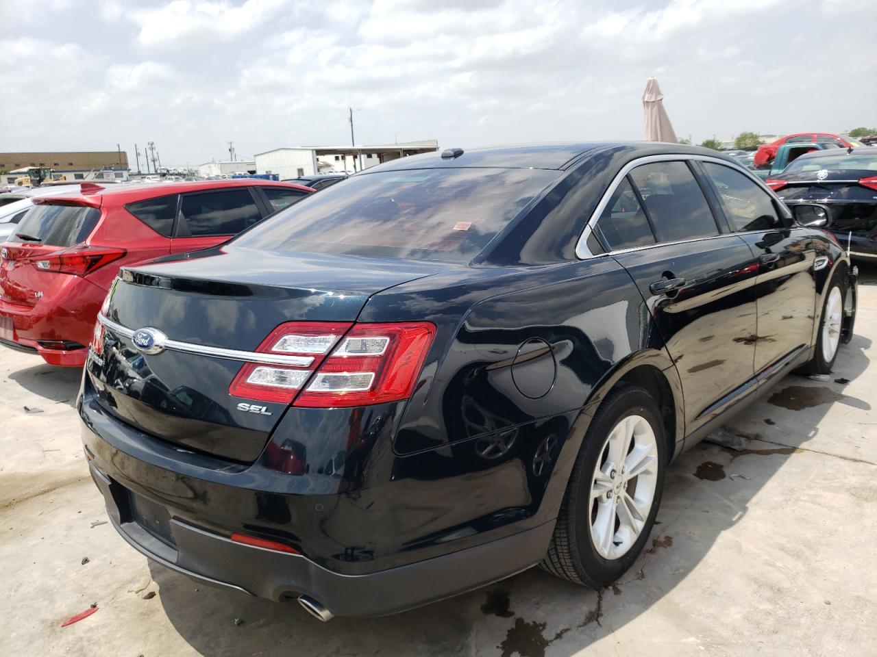 Photo 4 from auction – 2014 FORD TAURUS SEL with VIN 1FAHP2E82EG110609