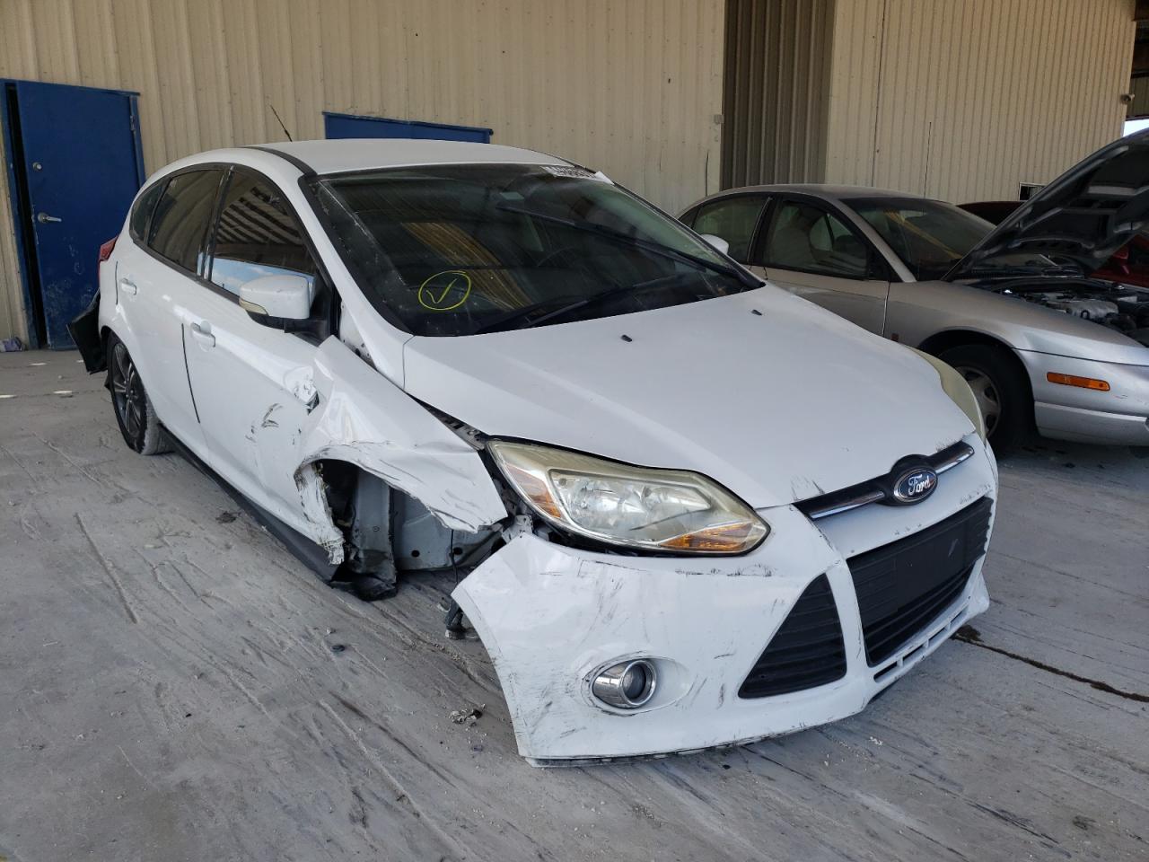 Фото 1 с аукциона – 2014 FORD FOCUS SE с VIN 1FADP3K2XEL115259