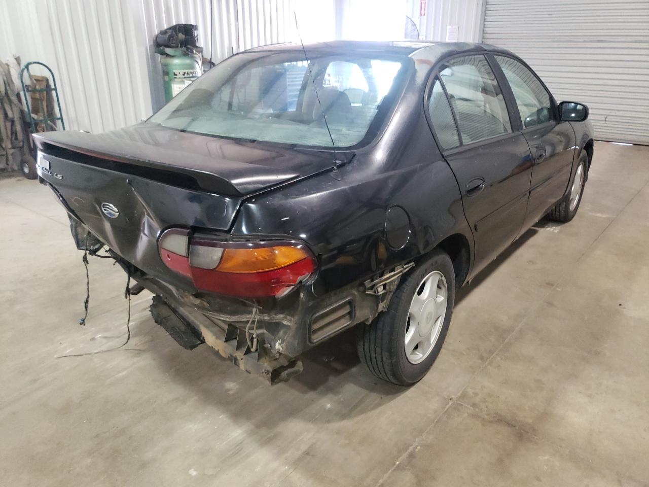 Photo 4 from auction – 2000 CHEVROLET MALIBU LS with VIN 1G1NE52J5Y6146647