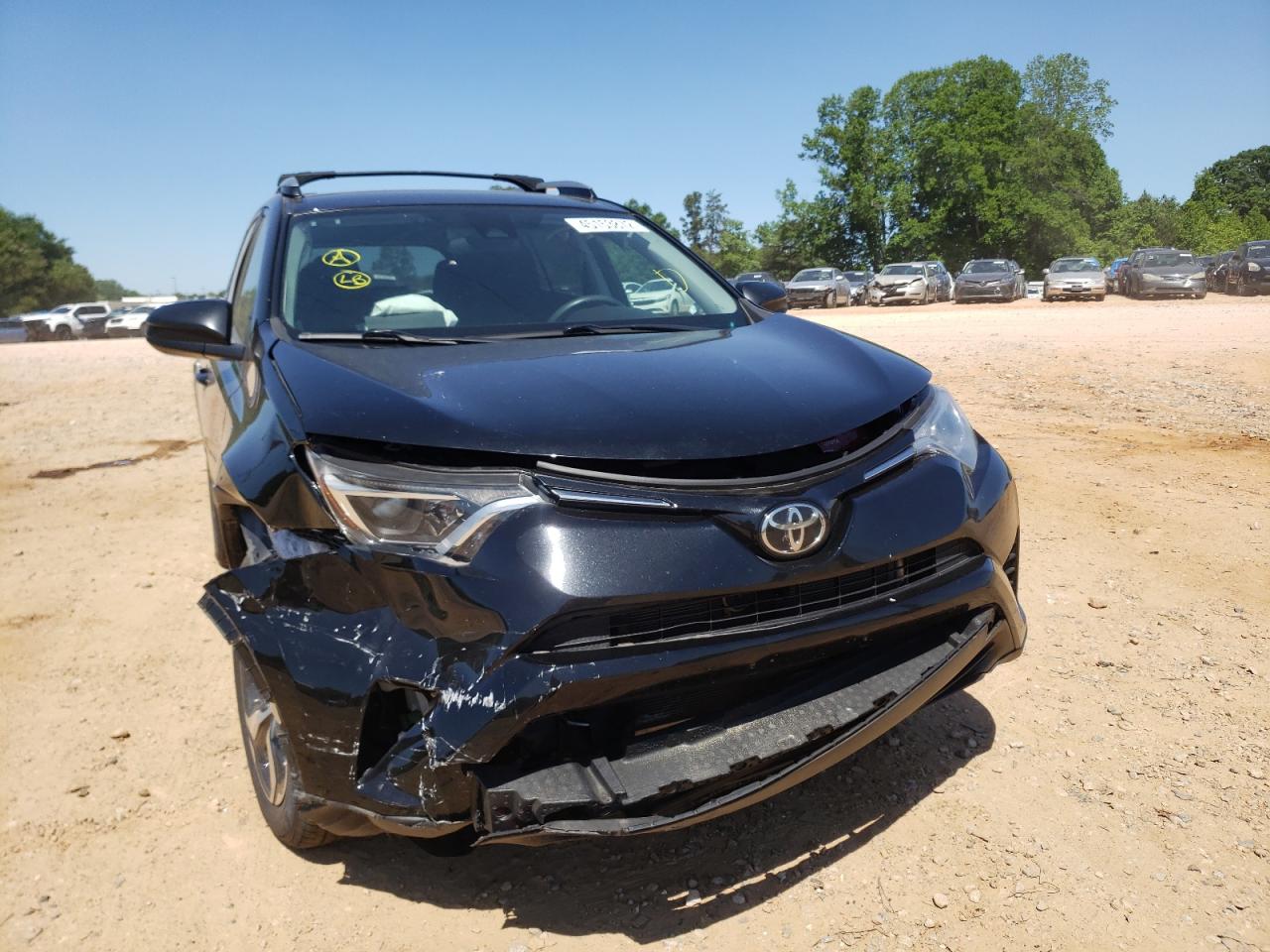 Photo 9 from auction – 2017 TOYOTA RAV4 LE with VIN 2T3BFREV2HW611865