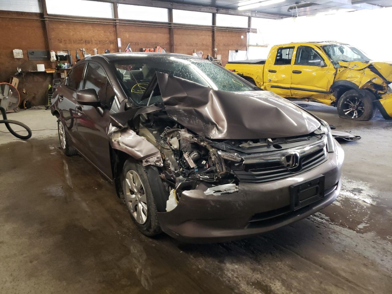 HONDA CIVIC LX 2012 with VIN 2HGFB2F56CH589883 - Photo from auction