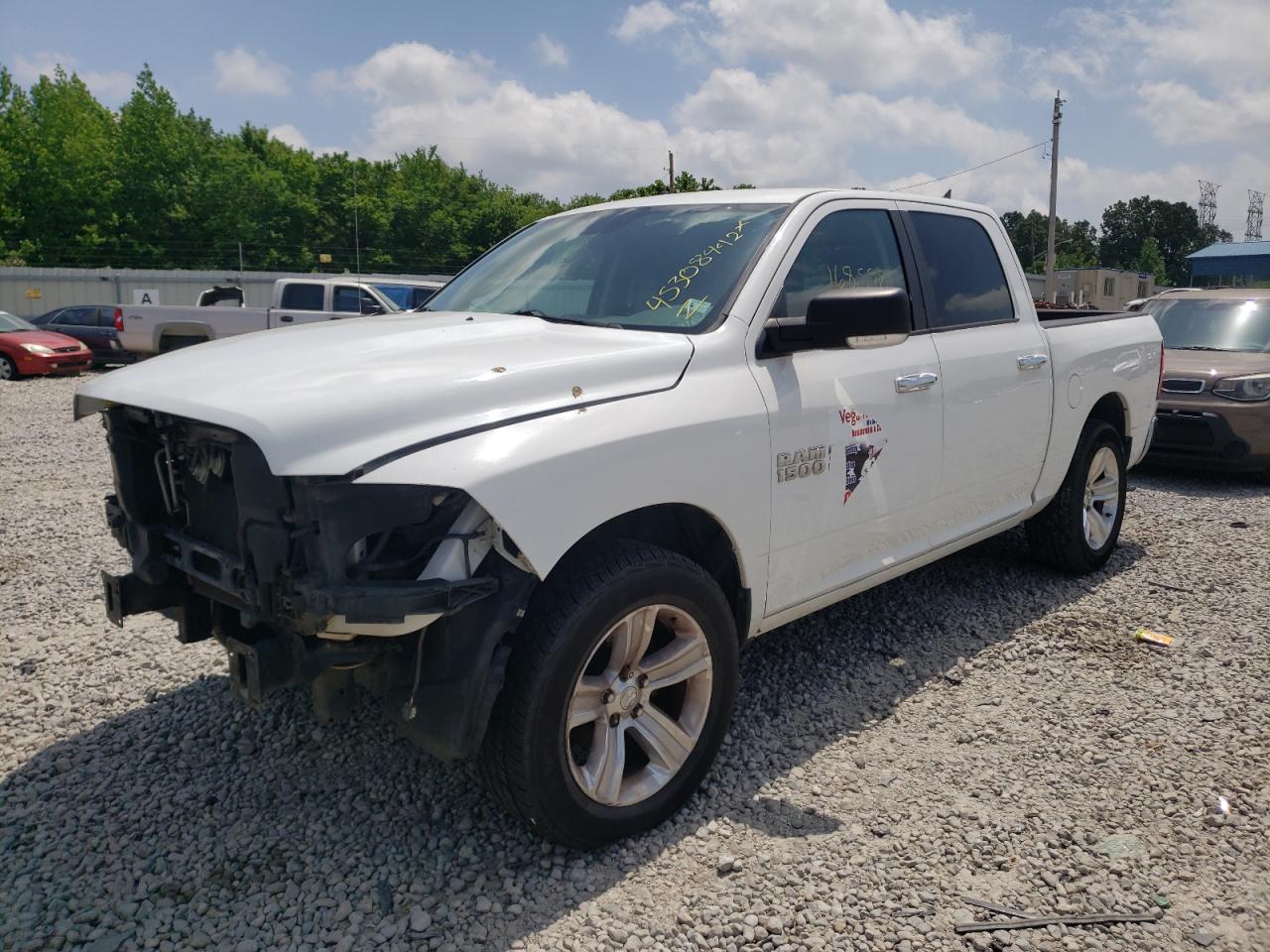 Photo 2 from auction – 2014 RAM 1500 SLT with VIN 1C6RR6LT5ES455757
