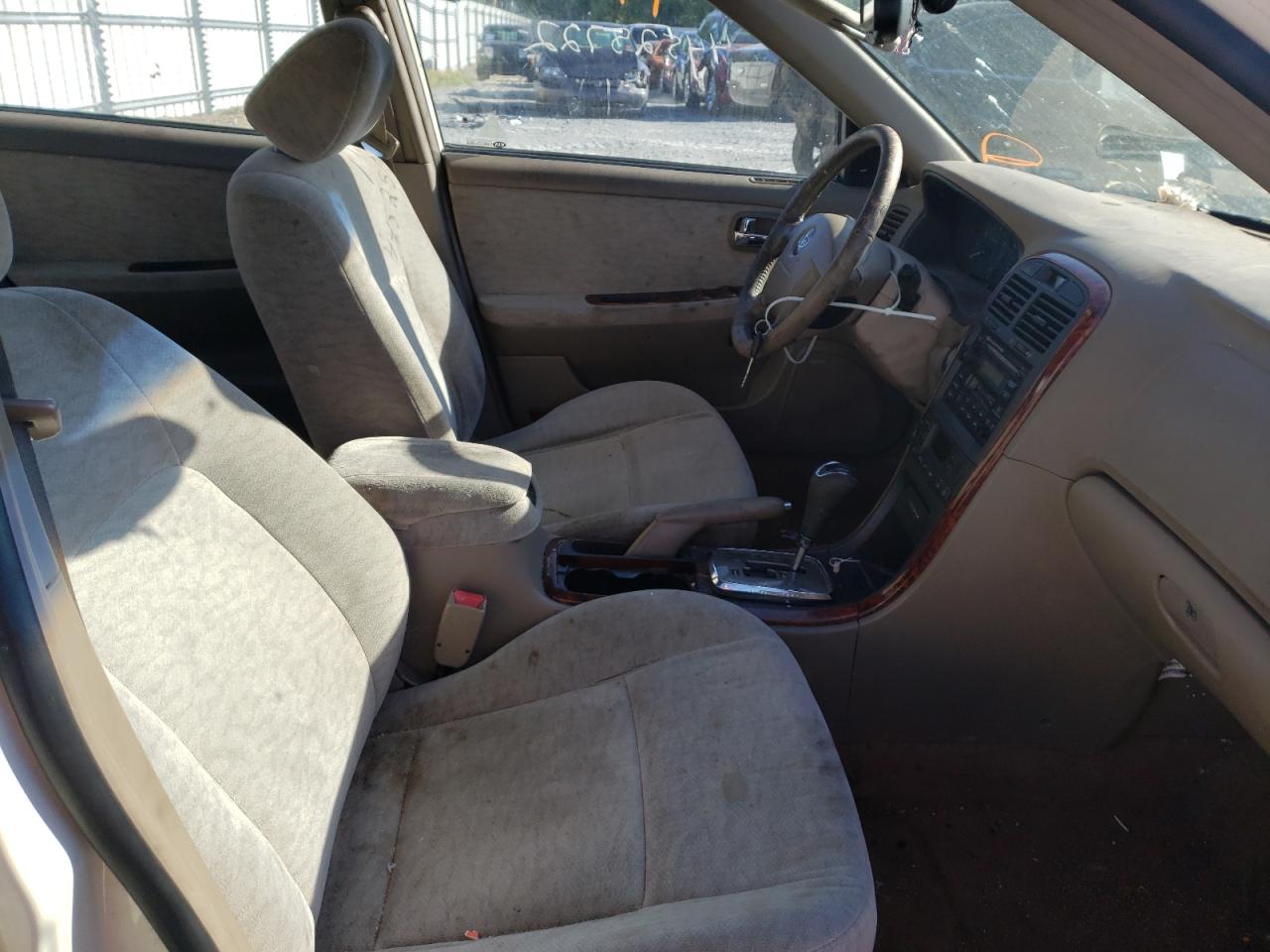 Photo 5 from auction – 2006 KIA OPTIMA LX with VIN KNAGD128465442672
