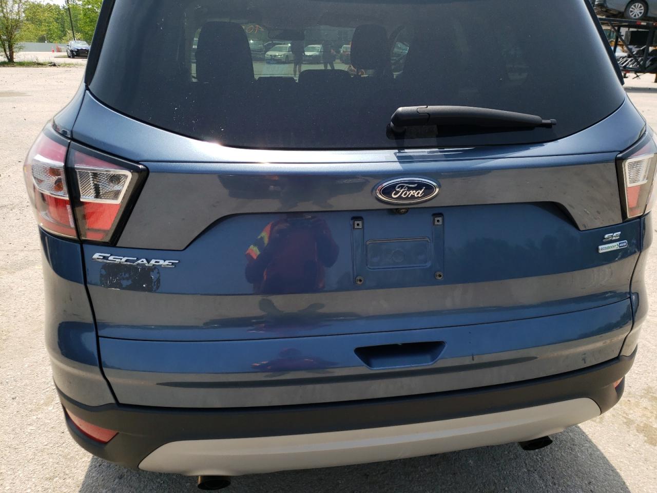 Photo 9 from auction – 2018 FORD ESCAPE SE with VIN 1FMCU9GD0JUC24244