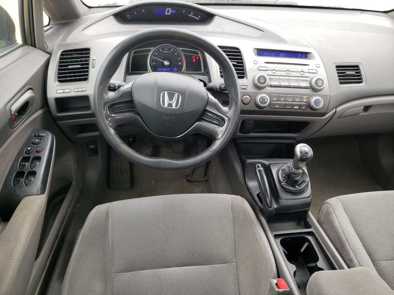 Photo 9 from auction – 2007 HONDA CIVIC DX with VIN 2HGFA15377H030040