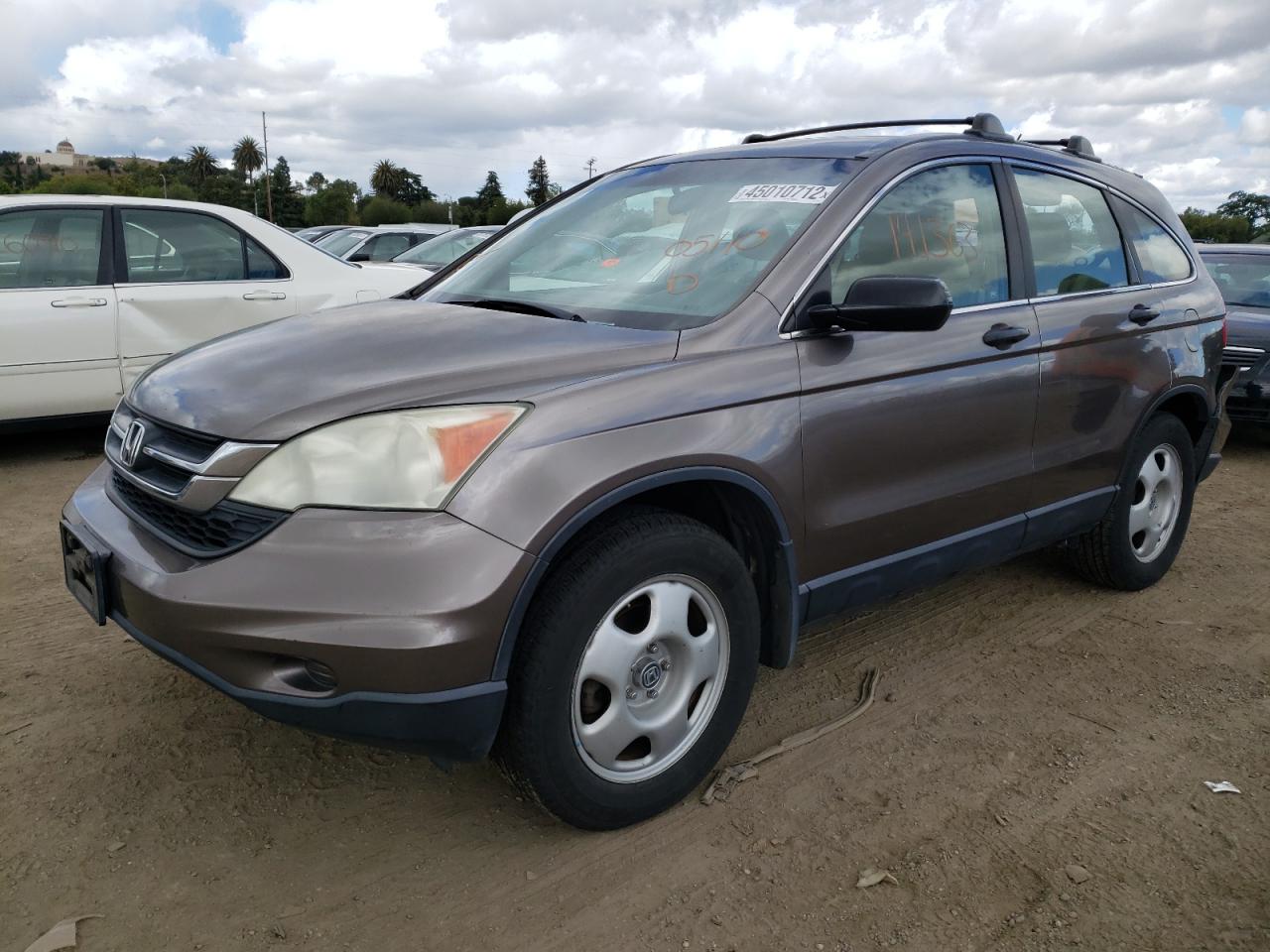 Photo 2 from auction – 2011 HONDA CR-V LX with VIN 5J6RE3H36BL035601