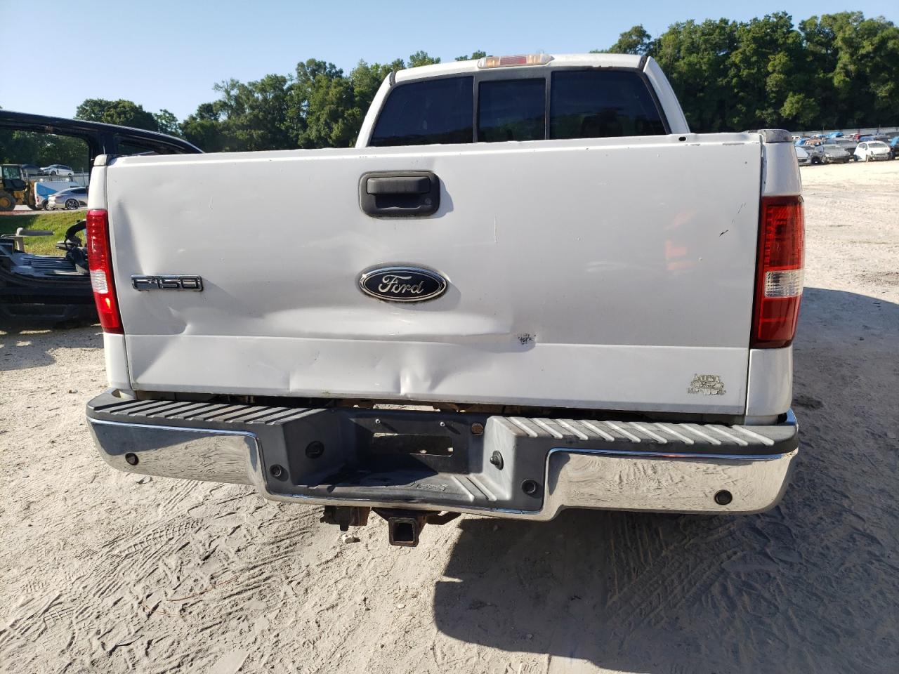 Photo 9 from auction – 2004 FORD F150 with VIN 1FTPX12514NB86651
