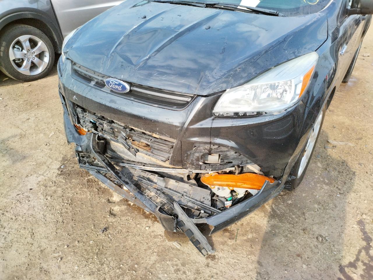 Photo 9 from auction – 2014 FORD ESCAPE S with VIN 1FMCU0F75EUC35401