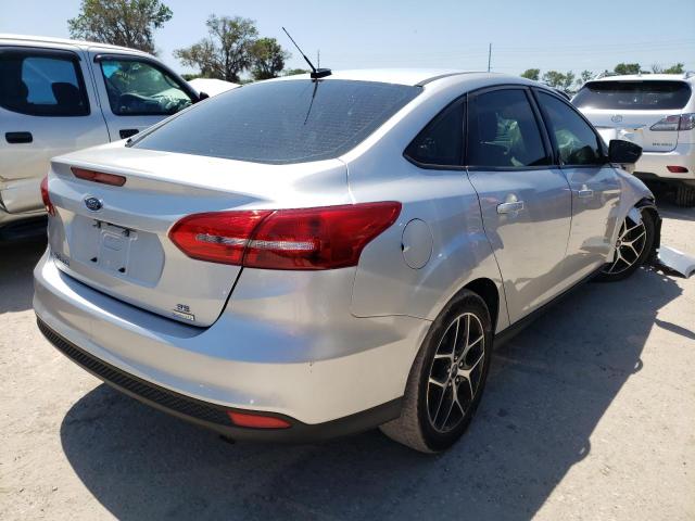 Photo 4 from auction – 2017 FORD FOCUS SE with VIN 1FADP3FE1HL289357