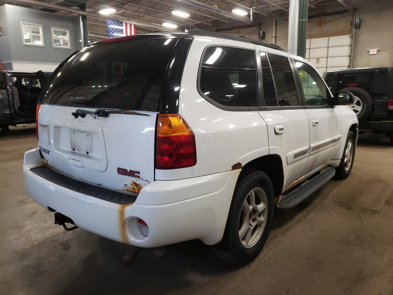 Photo 4 from auction – 2002 GMC ENVOY with VIN 1GKDT13S722354279