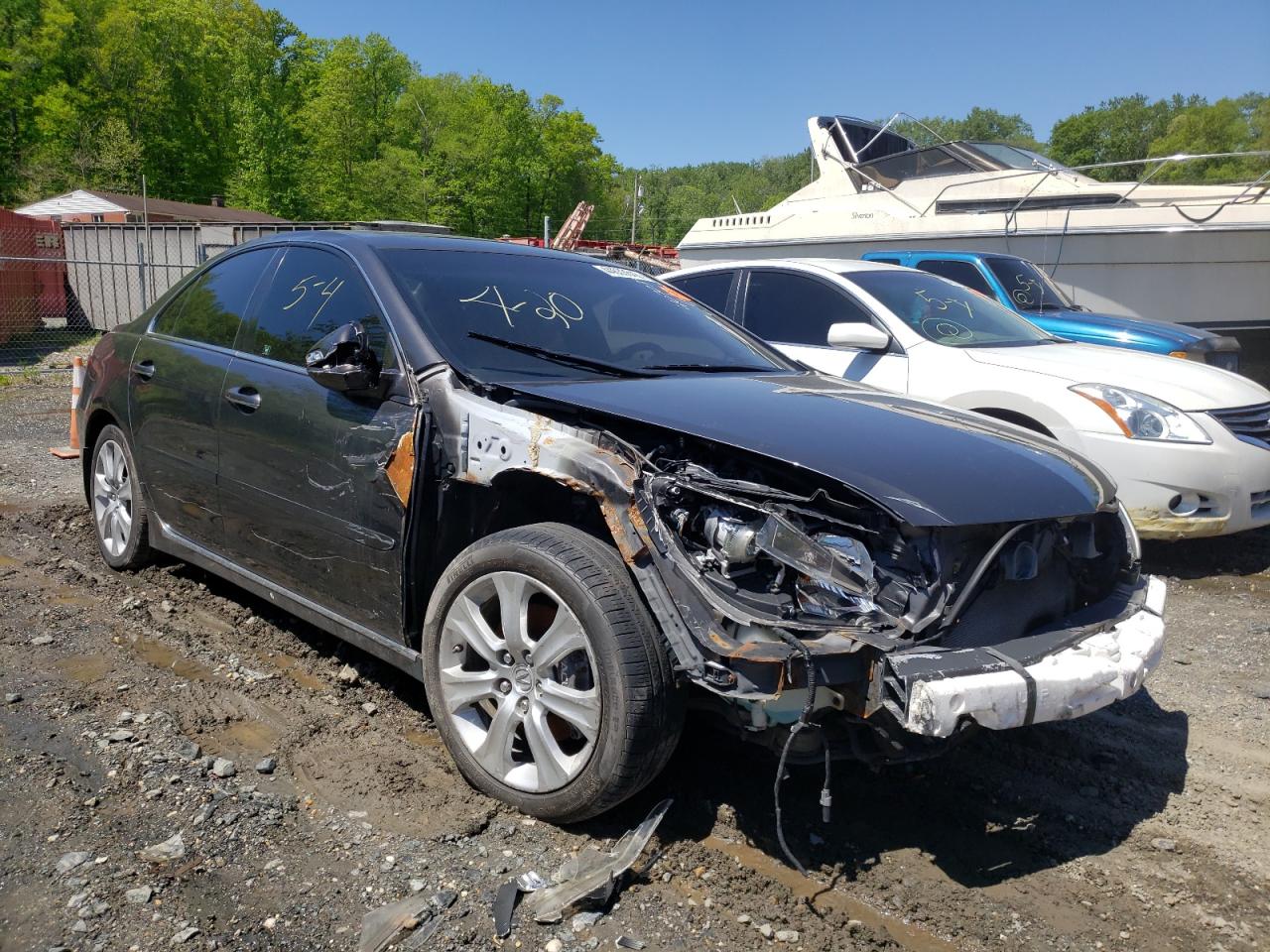 ACURA RL 2009 with VIN JH4KB266X9C000561 - Photo from auction