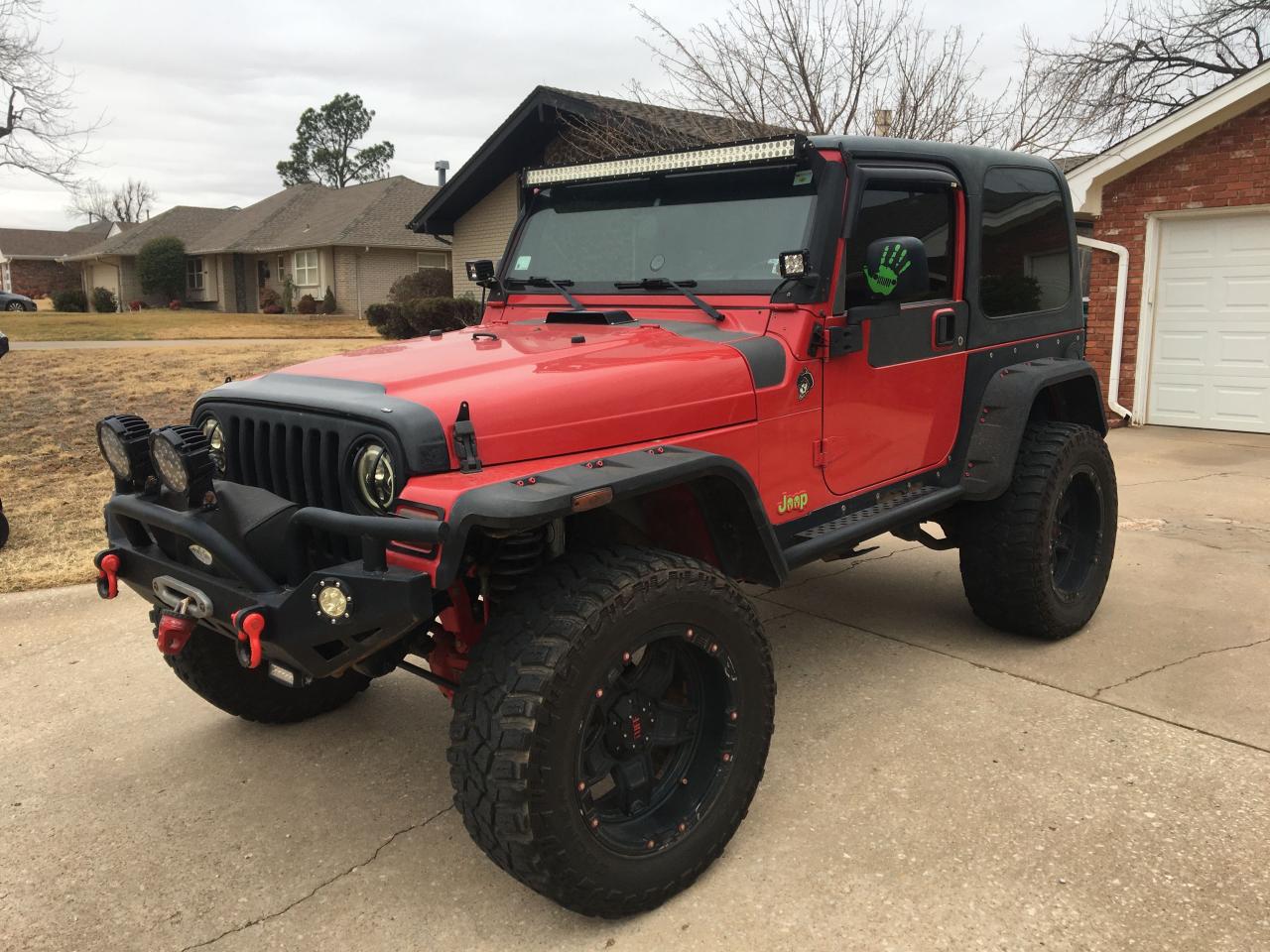 Photo 2 from auction – 2003 JEEP WRANGLER C with VIN 1J4FA39S23P342116