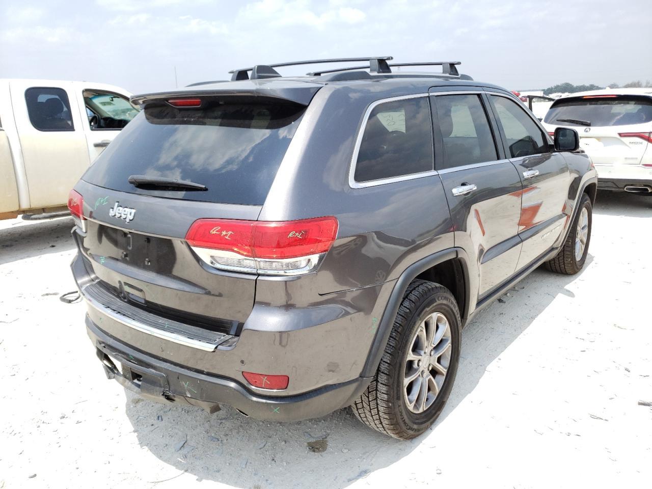 Photo 4 from auction – 2014 JEEP GRAND CHER with VIN 1C4RJFBG4EC197052
