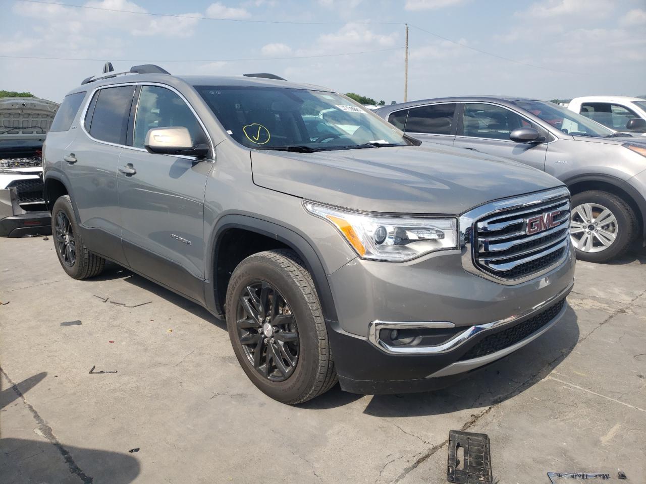 GMC ACADIA SLT 2019 with VIN 1GKKNMLS1KZ247044 - Photo from auction