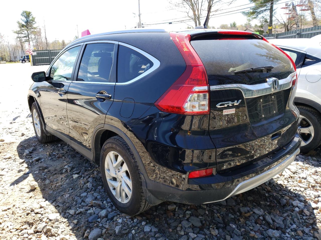 Photo 3 from auction – 2016 HONDA CR-V EXL with VIN 5J6RM4H7XGL007609