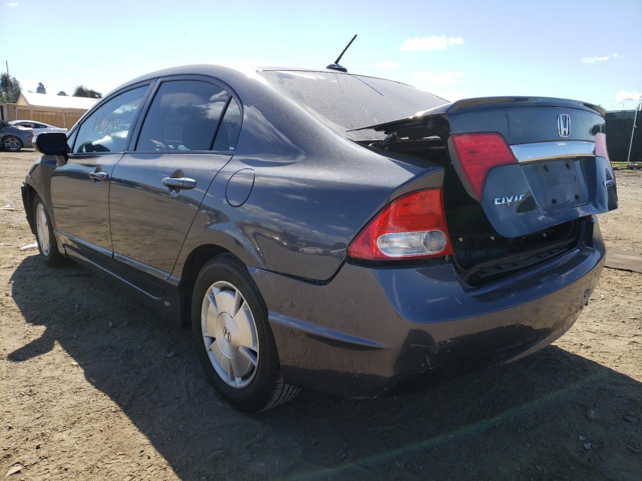 Photo 3 from auction – 2010 HONDA CIVIC HYBR with VIN JHMFA3F21AS001034
