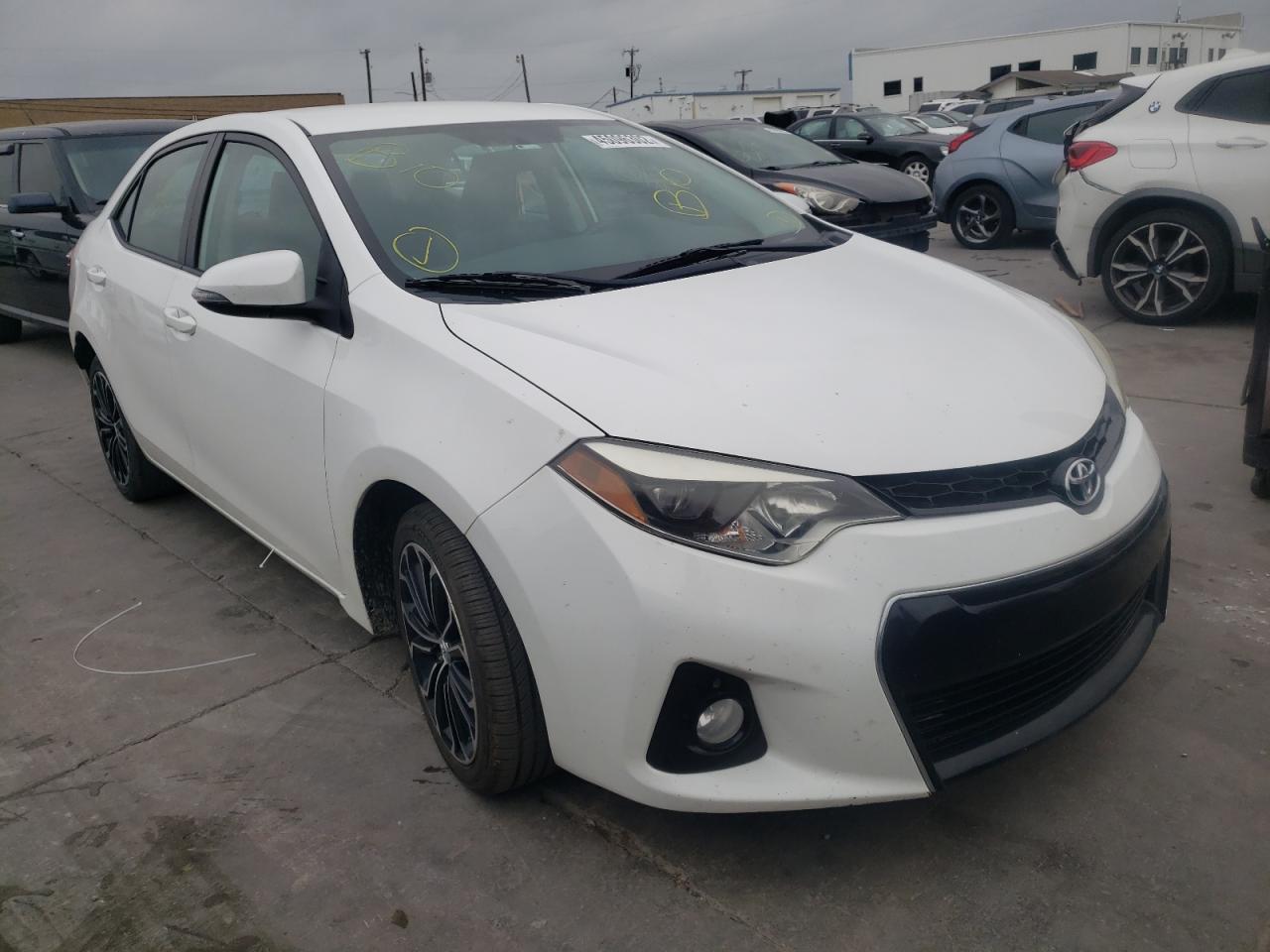 TOYOTA COROLLA L 2014 with VIN 5YFBURHE2EP059811 - Photo from auction