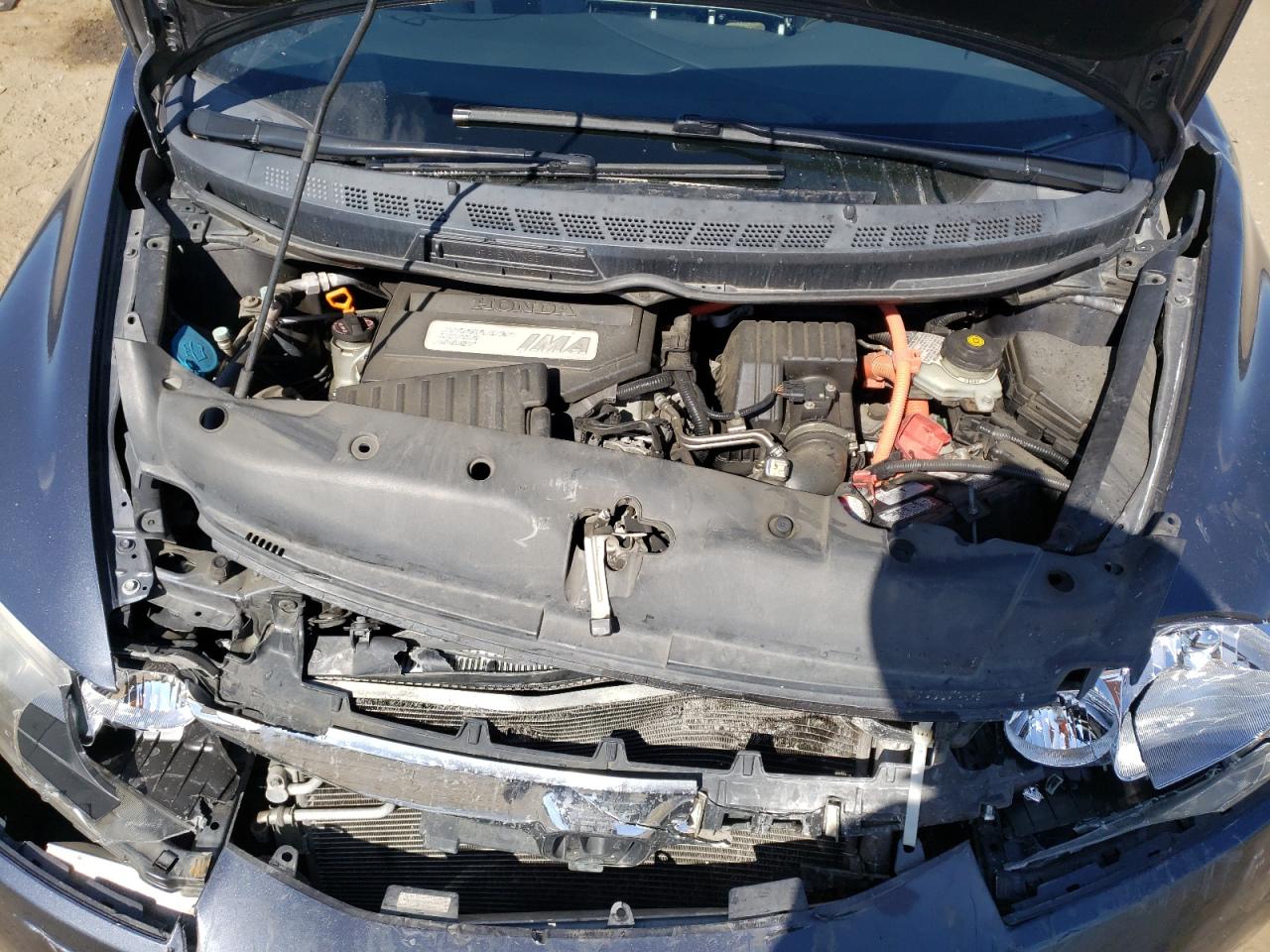 Photo 7 from auction – 2010 HONDA CIVIC HYBR with VIN JHMFA3F21AS001034
