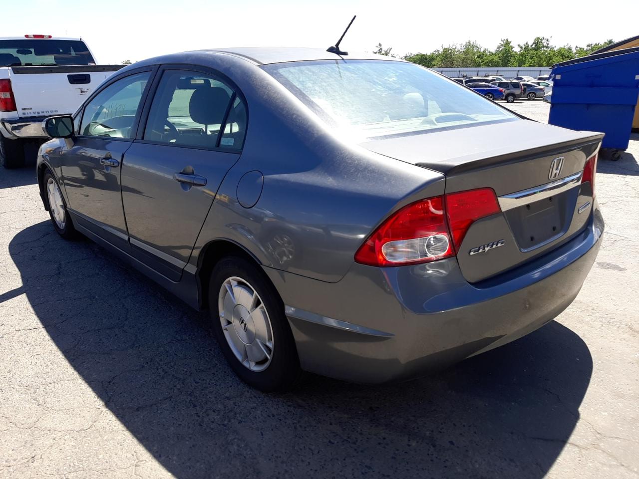 Photo 3 from auction – 2010 HONDA CIVIC HYBR with VIN JHMFA3F20AS005205