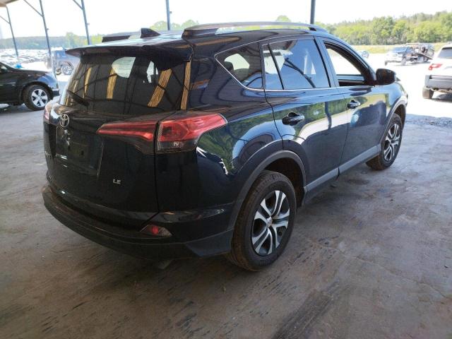 Photo 4 from auction – 2018 TOYOTA RAV4 LE with VIN JTMZFREV6JJ752909