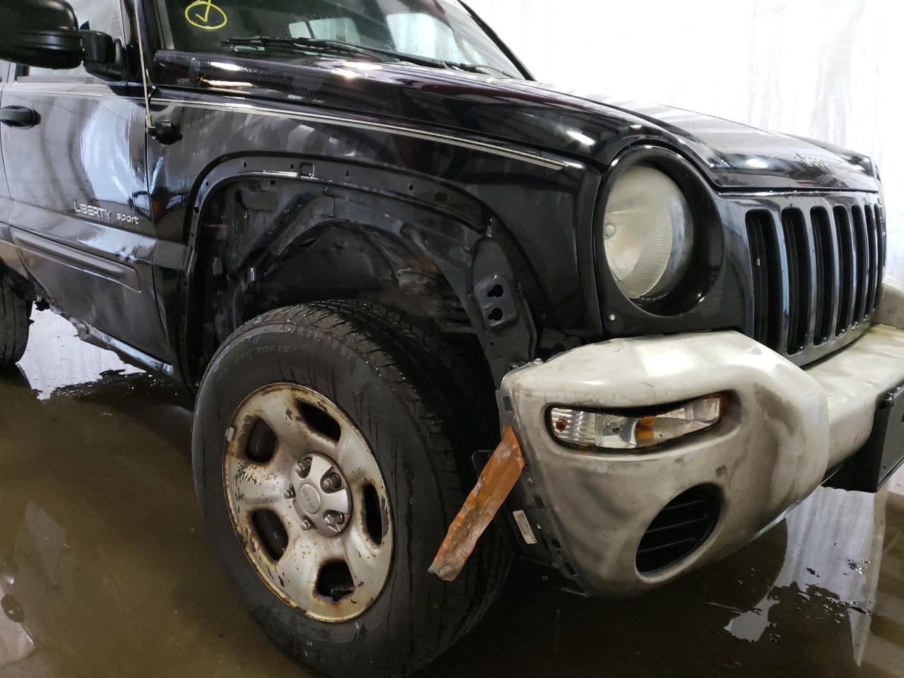 Photo 9 from auction – 2003 JEEP LIBERTY SP with VIN 1J4GL48K43W645281