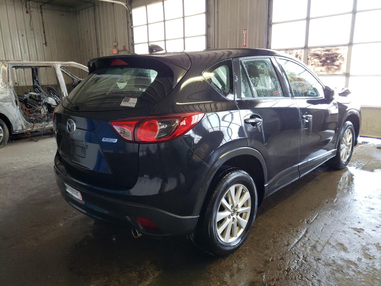 Photo 4 from auction – 2013 MAZDA CX-5 SPORT with VIN JM3KE4BE2D0142051