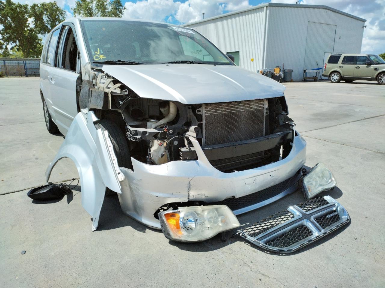 DODGE GRAND CARA 2011 with VIN 2D4RN4DG9BR764156 - Photo from auction
