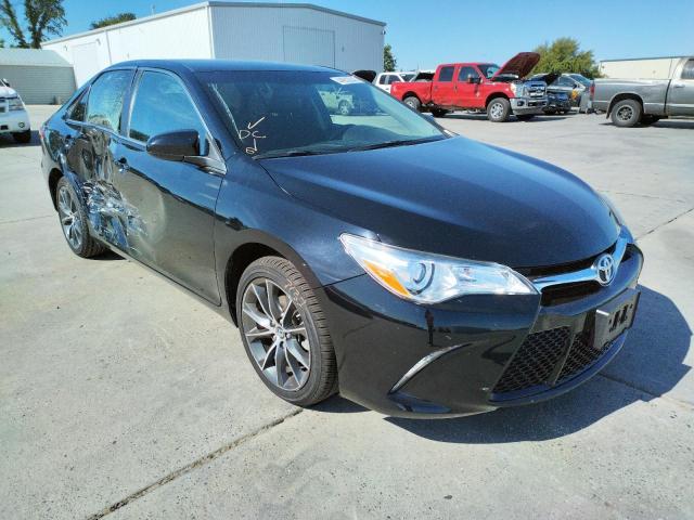 TOYOTA CAMRY LE 2015 with VIN 4T1BF1FK4FU101481 - Photo from auction