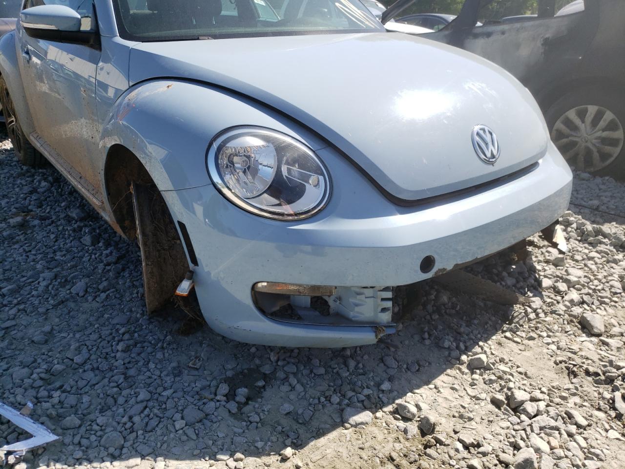 Photo 18 from auction – 2013 VOLKSWAGEN BEETLE with VIN 3VWJX7AT5DM660486