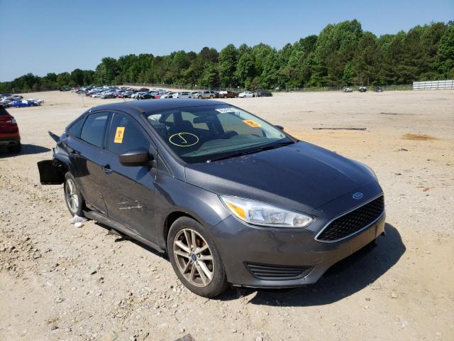 FORD FOCUS SE 2018 with VIN 1FADP3F28JL226476 - Photo from auction