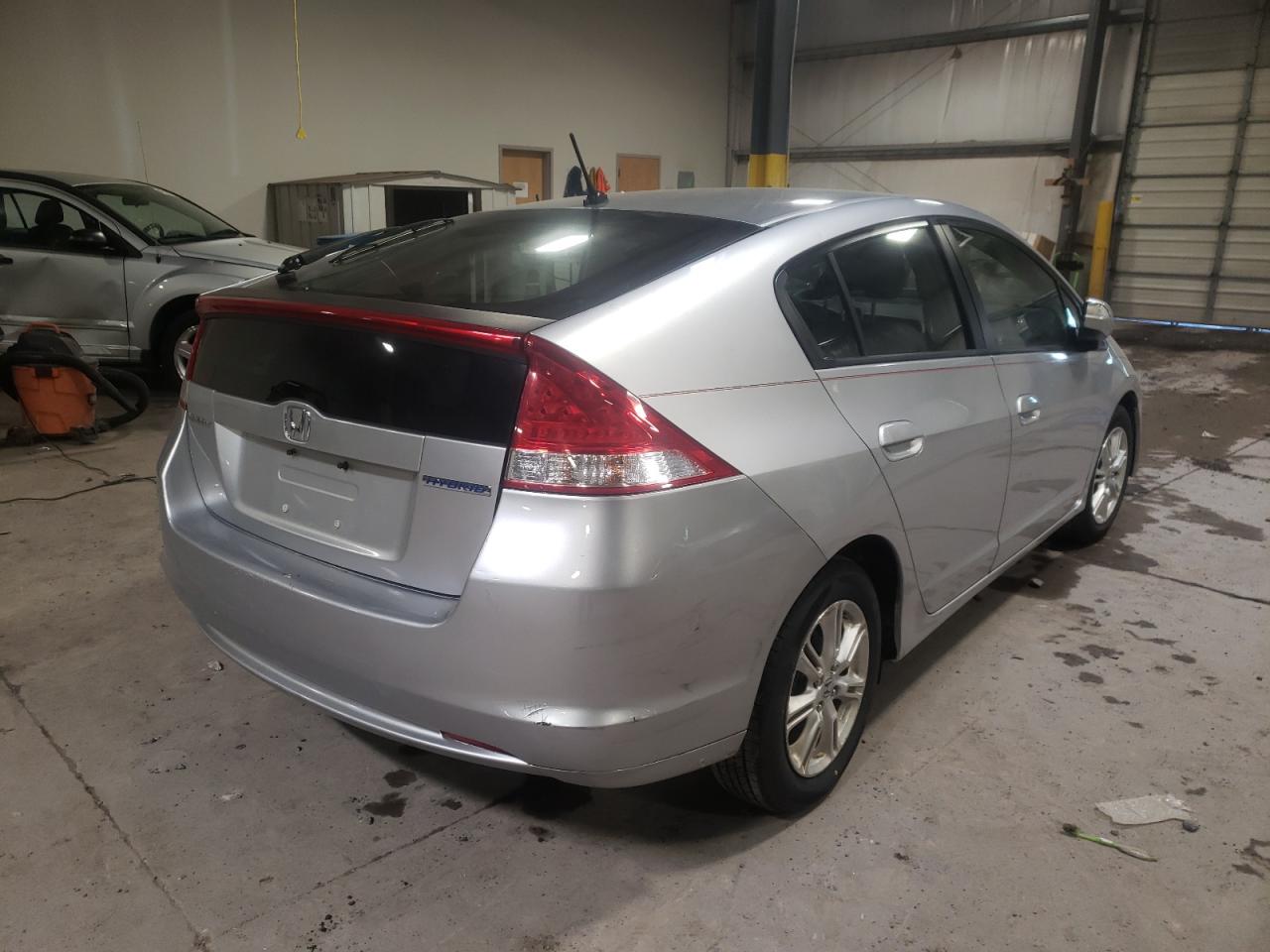 Photo 4 from auction – 2010 HONDA INSIGHT EX with VIN JHMZE2H76AS003706