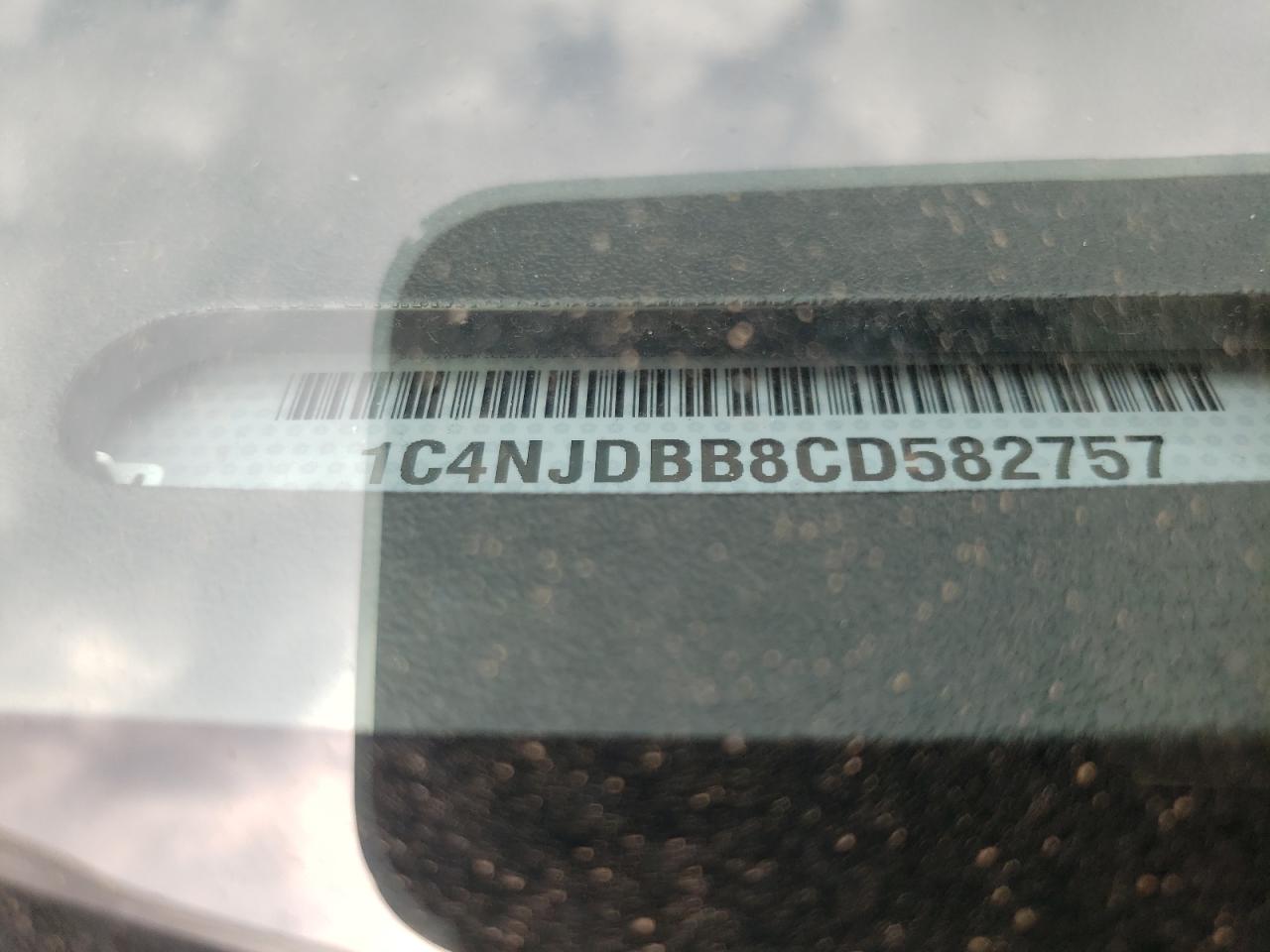 Photo 10 from auction – 2012 JEEP COMPASS SP with VIN 1C4NJDBB8CD582757