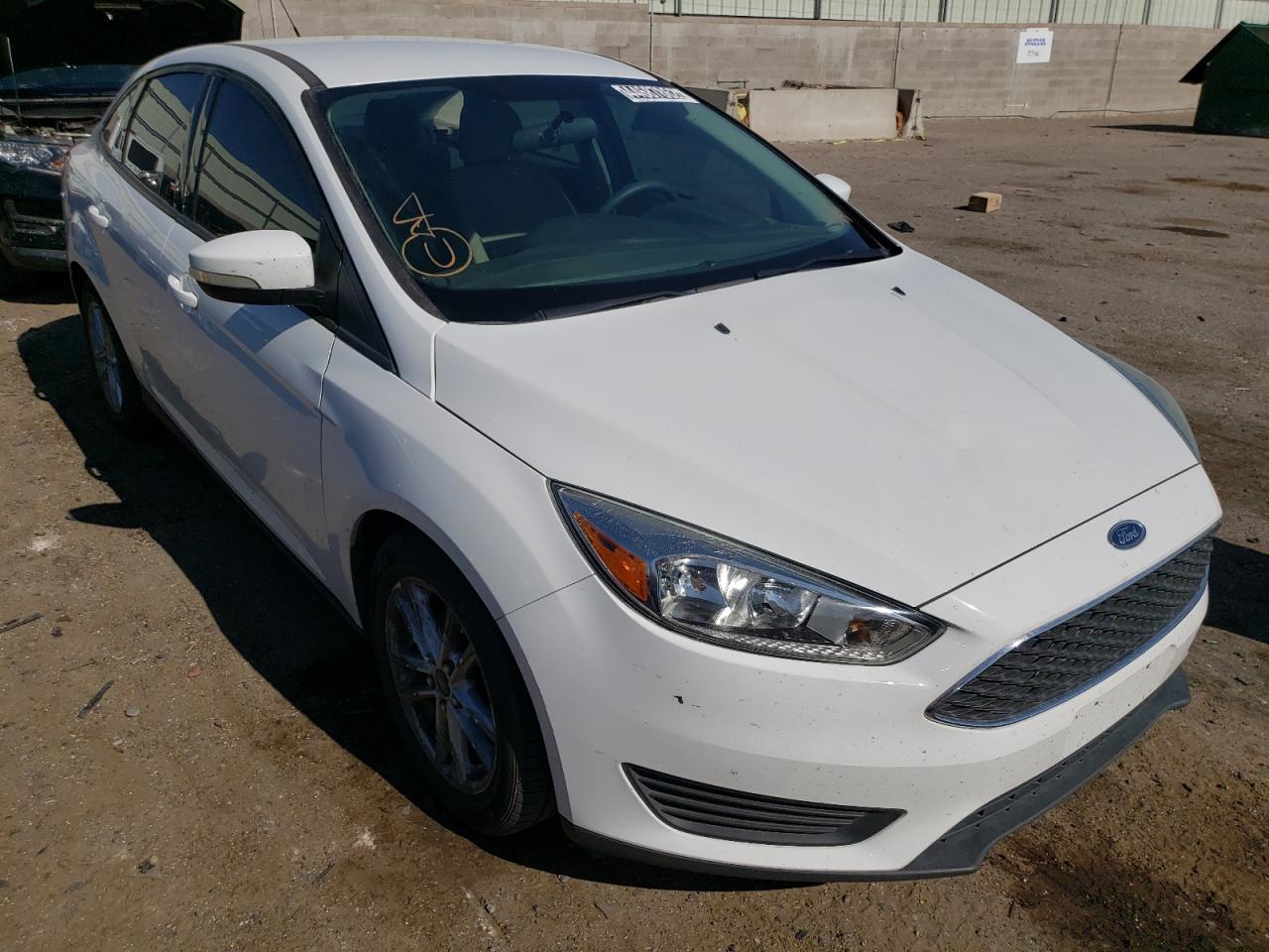 FORD FOCUS SE 2015 with VIN 1FADP3F27FL255779 - Photo from auction