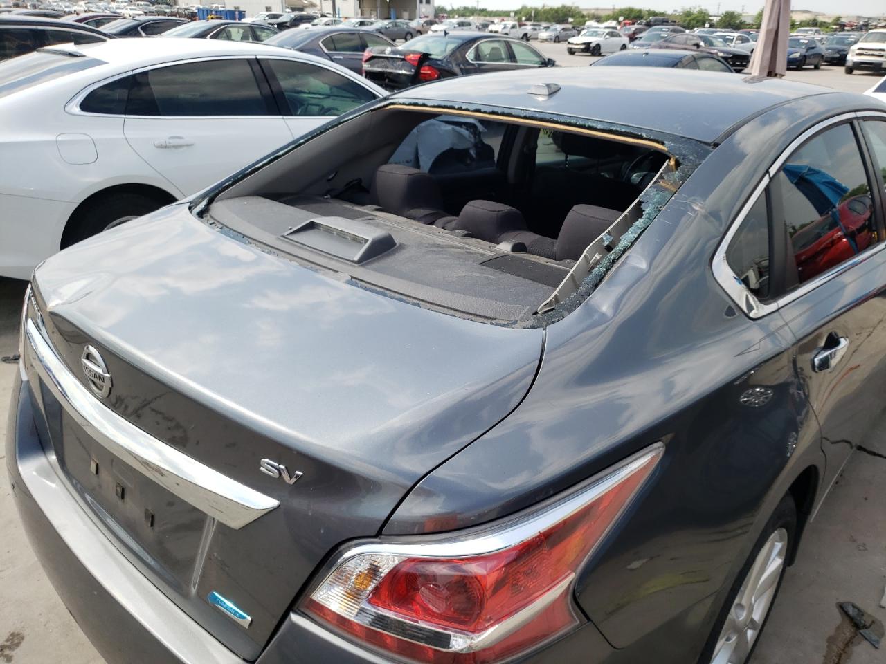 Photo 9 from auction – 2014 NISSAN ALTIMA 2.5 with VIN 1N4AL3AP4EN249474