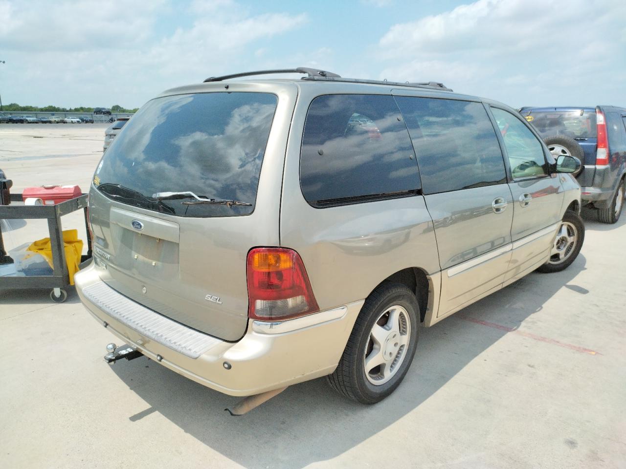 Photo 4 from auction – 2000 FORD WINDSTAR with VIN 2FMDA5344YBA72352