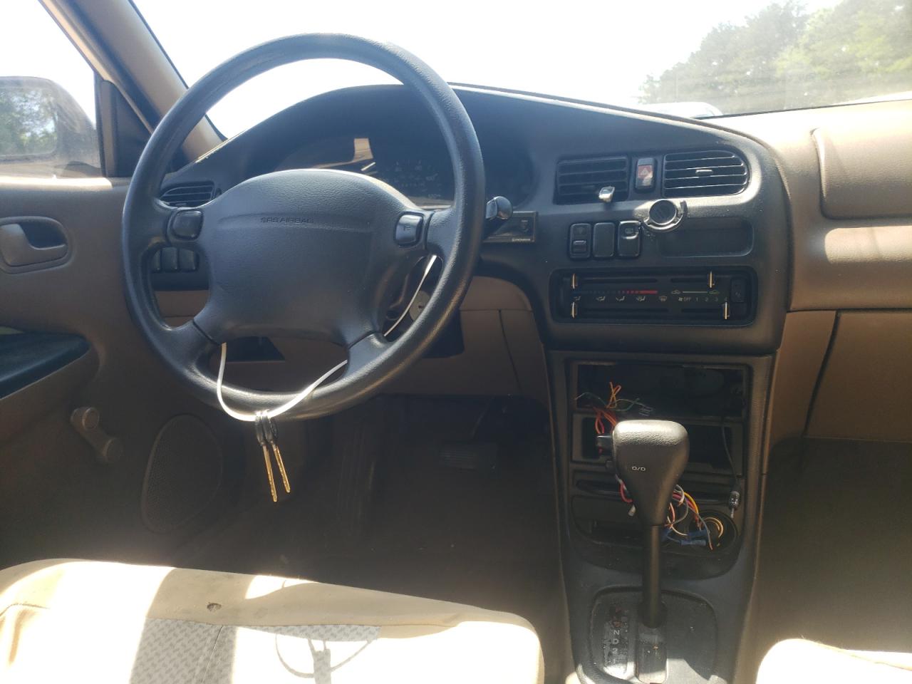 Photo 9 from auction – 1995 MAZDA PROTEGE DX with VIN JM1BA1410S0168707