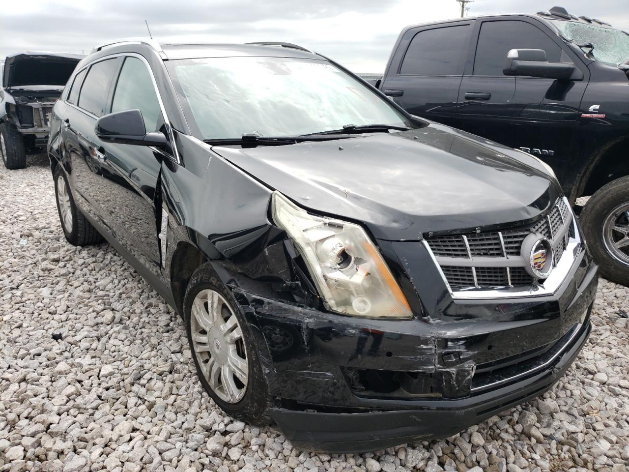 CADILLAC SRX LUXURY 2011 with VIN 3GYFNAEY9BS628516 - Photo from auction