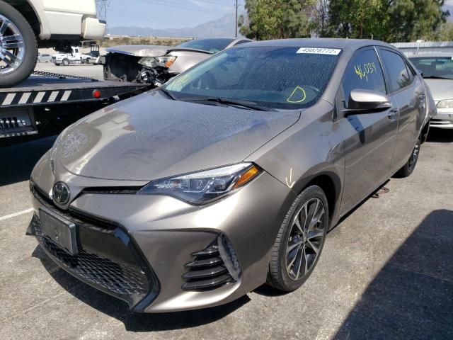 Photo 2 from auction – 2017 TOYOTA COROLLA L with VIN 5YFBURHE9HP631672
